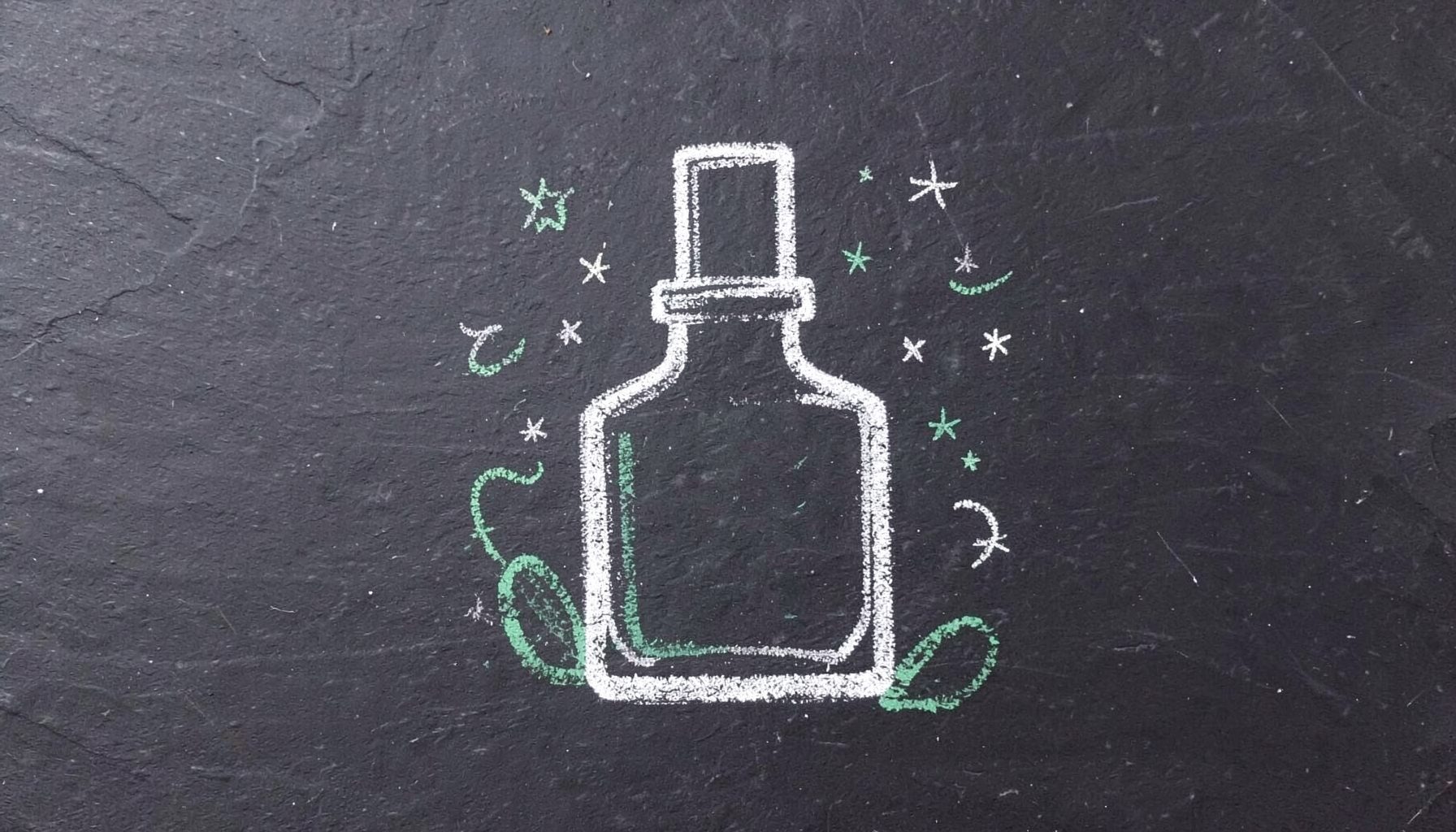 A chalk drawing on a dark slate board showing a delicate nail polish bottle outline with tiny stars and swirls around it, in soft white and pale green chalk against the deep charcoal slate.