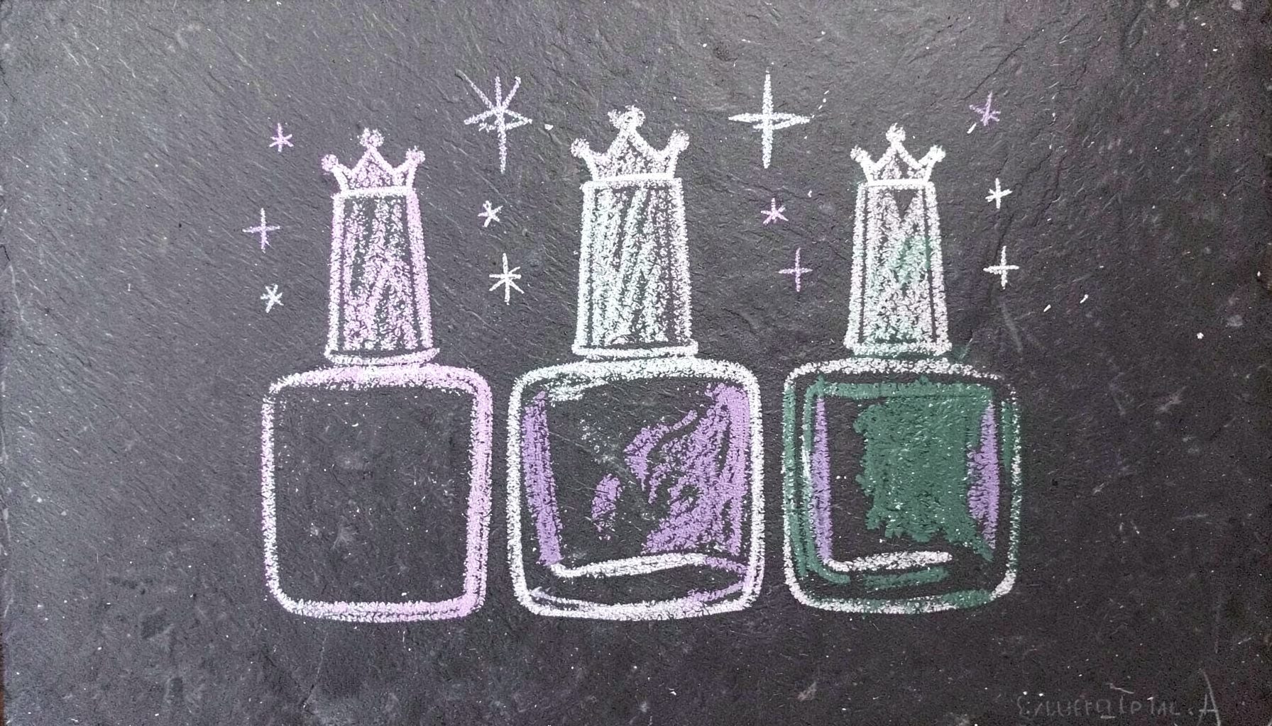 A chalk drawing on a dark slate board of three nail polish bottles in a row, their caps shaped like tiny crowns, with shimmering stars around them, drawn in white and soft lavender chalk.